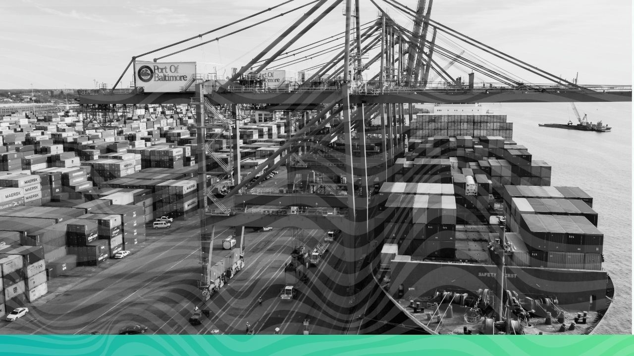 A large container cargo ship carrying goods across ocean waters near a commercial port, representing UK CBAM carbon compliance and global green trade.